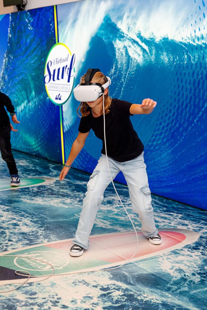 Virtual surfing with tricks and performance-based scoring